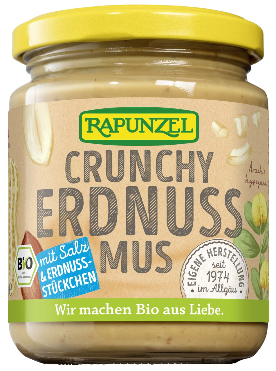 Geröstetes Rapunzel Bio Erdnussmus Crunchy mit Salz in einem Glas, ideal für Frühstück und Brotaufstriche.