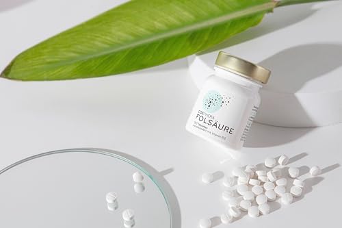 COSPHERA Folsäure Produkt mit Tabletten und dekorativem Blatt