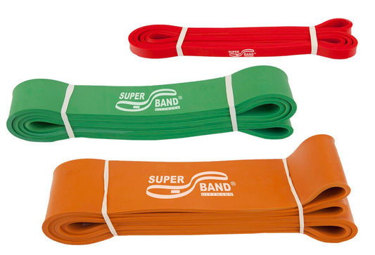 Dittmann SUPERBAND 3er Set in Rot, Grün und Orange, Gymnastikbänder für Reha und Therapie, liegt auf weißem Hintergrund