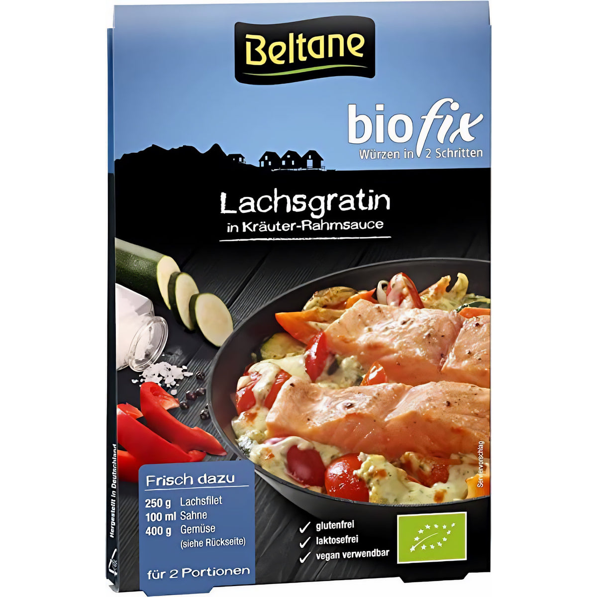 Beltane Bio Fix für Lachsgratin, 20g, in einer offenen Packung, mit frischen Lachsfilets und Gewürzen auf einem Küchenhintergrund