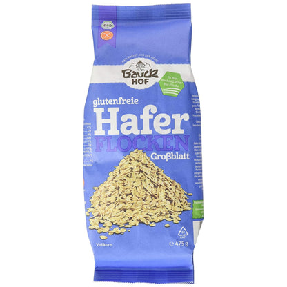 Vorderansicht einer verschlossenen Packung Bauck Mühle Haferflocken Grob 475g auf weißem Hintergrund.