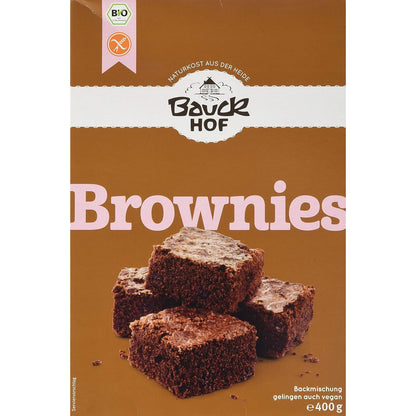 Vorderseite der Bauckhof Brownies Backmischung glutenfrei, braune Verpackung mit Abbildung von vier Brownies.