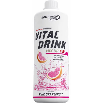 Vital Drink Pink Grapefruit von Best Body Nutrition, Flasche schräg, Grapefruitstücke und rosa Wasserspritzer auf dem Etikett.