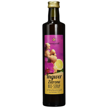 Sonnentor Ingwer-Zitronen Sirup in dunkler Flasche mit violett-gelbem Etikett, freigestellt vor weißem Hintergrund.