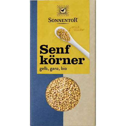 Vorderseite der Sonnentor Senfkörner gelb ganz 120g Packung mit Sichtfenster und gelbem Etikett auf weißem Hintergrund.