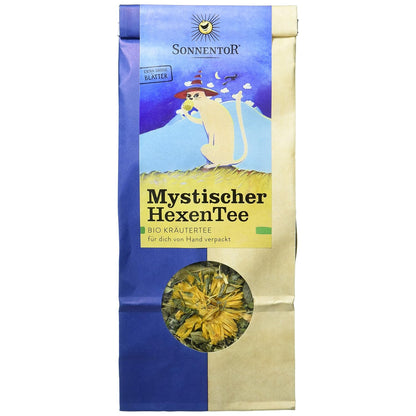 Sonnentor Mystischer HexenTee lose, Kräutertee in blau-gelber Verpackung mit Sichtfenster und Katzenmotiv, freigestellt vor weißem Hintergrund.