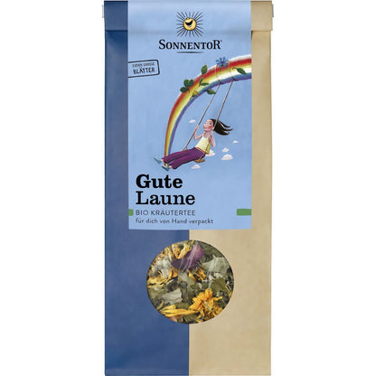 Sonnentor Gute Laune Kräutertee lose, 50g-Packung frontal fotografiert, Sichtfenster zeigt bunte Kräutermischung, Verpackung mit Regenbogen-Illustration.