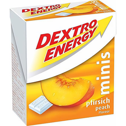 Schräg fotografierte Packung Dextro Energy mini pfirsich geschmack, Vorder- und Seitenansicht mit Pfirsichabbildung und Tablette.