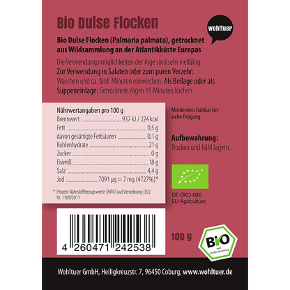Nährwerttabelle und Produktinformationen der Wohltuer Bio Dulseflocken 100g auf der Rückseite der Verpackung.