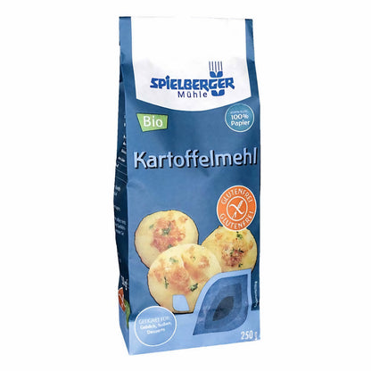 spielberger kartoffelmehl 250g, blaue Verpackung mit Sichtfenster, stehend vor weißem Hintergrund