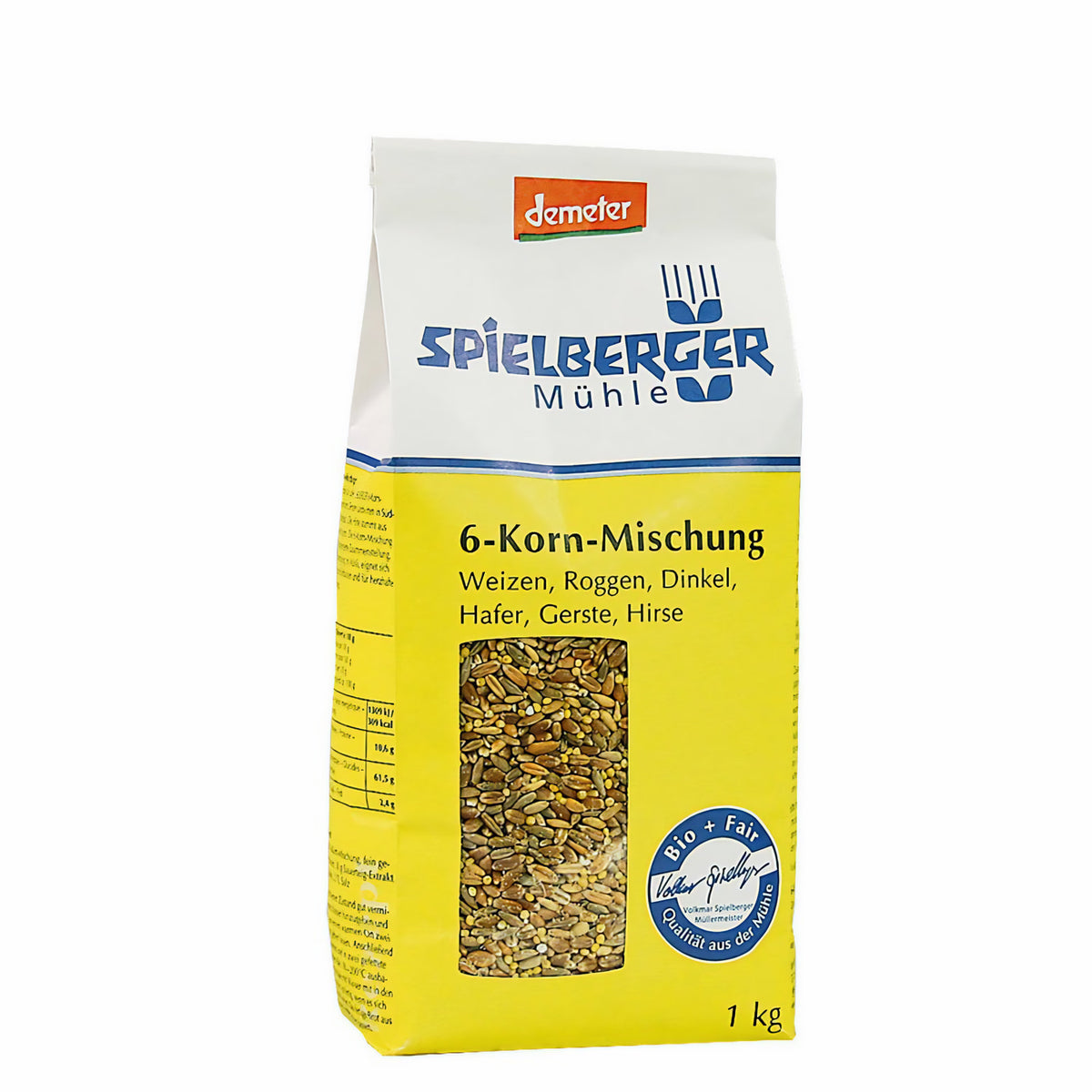 Spielberger Demeter 6-Korn-Mischung 1000g, leicht seitliche Ansicht der gelben Packung mit Sichtfenster, Produkt steht auf weißem Hintergrund.