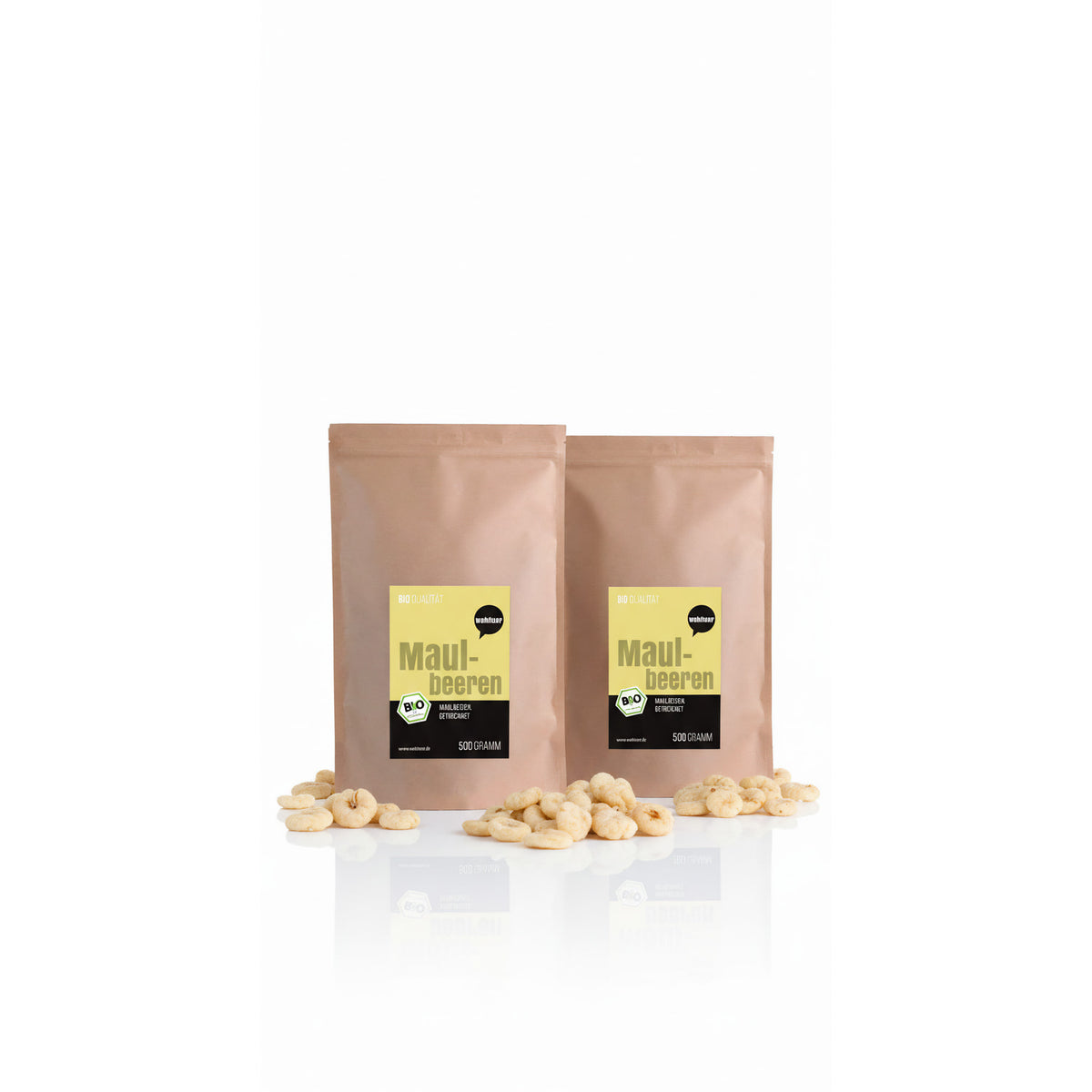Zwei braune Beutel wohltuer Maulbeeren getrocknet 500g, umgeben von getrockneten Früchten auf weißem Untergrund.