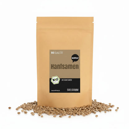 Ungeschälte Bio Hanfsamen von Wohltuer, Superfood, 1000g, in einer transparenten Schüssel auf weißem Hintergrund.