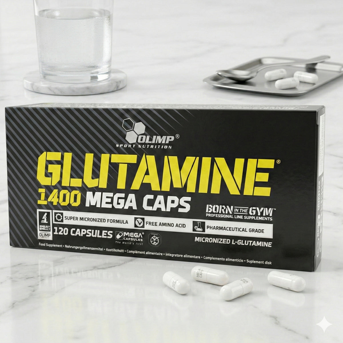 Olimp Glutamine Mega Caps, 120 Kapseln, BCAA und L-Glutamin in einer schwarzen Dose, nahegelegene Kapseln sichtbar