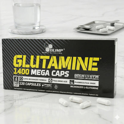 Olimp Glutamine Mega Caps, 120 Kapseln, BCAA und L-Glutamin in einer schwarzen Dose, nahegelegene Kapseln sichtbar