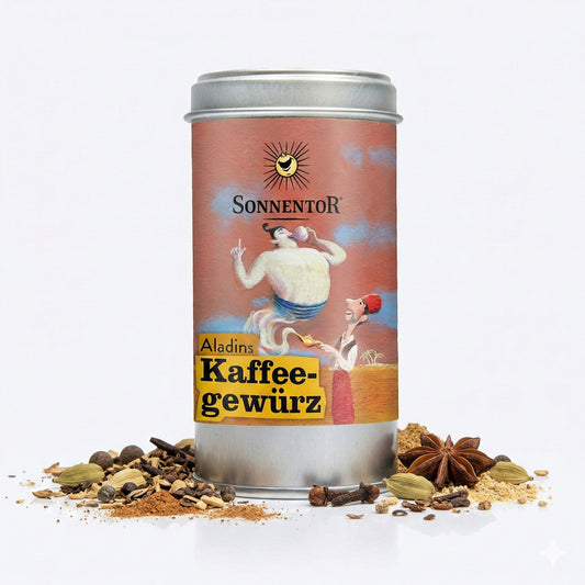 Sonnentor Aladins Kaffeegewürz Dose mit gemischten Gewürzen wie Kardamom, Sternanis und Nelken auf weißem Hintergrund.