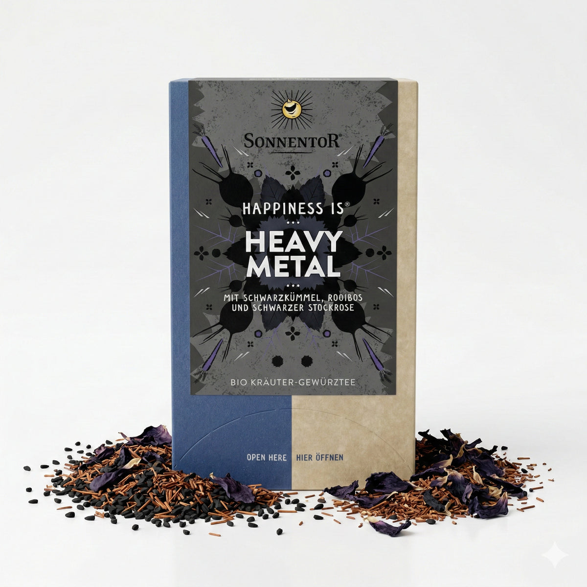 Packung Sonnentor Heavy Metal Kräutertee mit losem Tee, Gewürzen und Blütenblättern auf weißem Untergrund.
