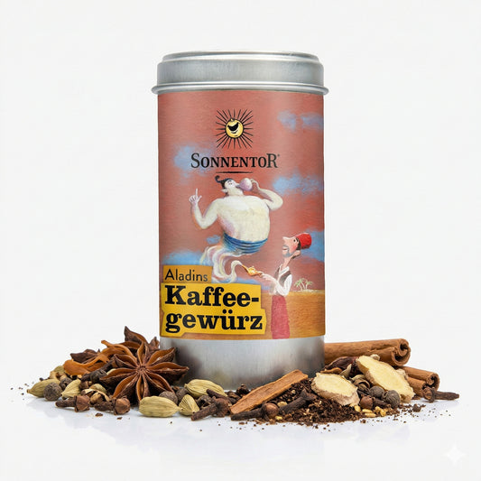 Sonnentor Aladins Kaffeegewürz Vorratsdose mit Gewürzen wie Zimt, Sternanis und Kardamom auf weißem Hintergrund, Produkt im Fokus.