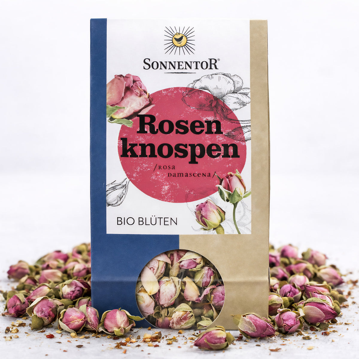 Packung Sonnentor Rosenknospen lose, 6x30g, umgeben von getrockneten Rosenknospen auf weißem Untergrund.