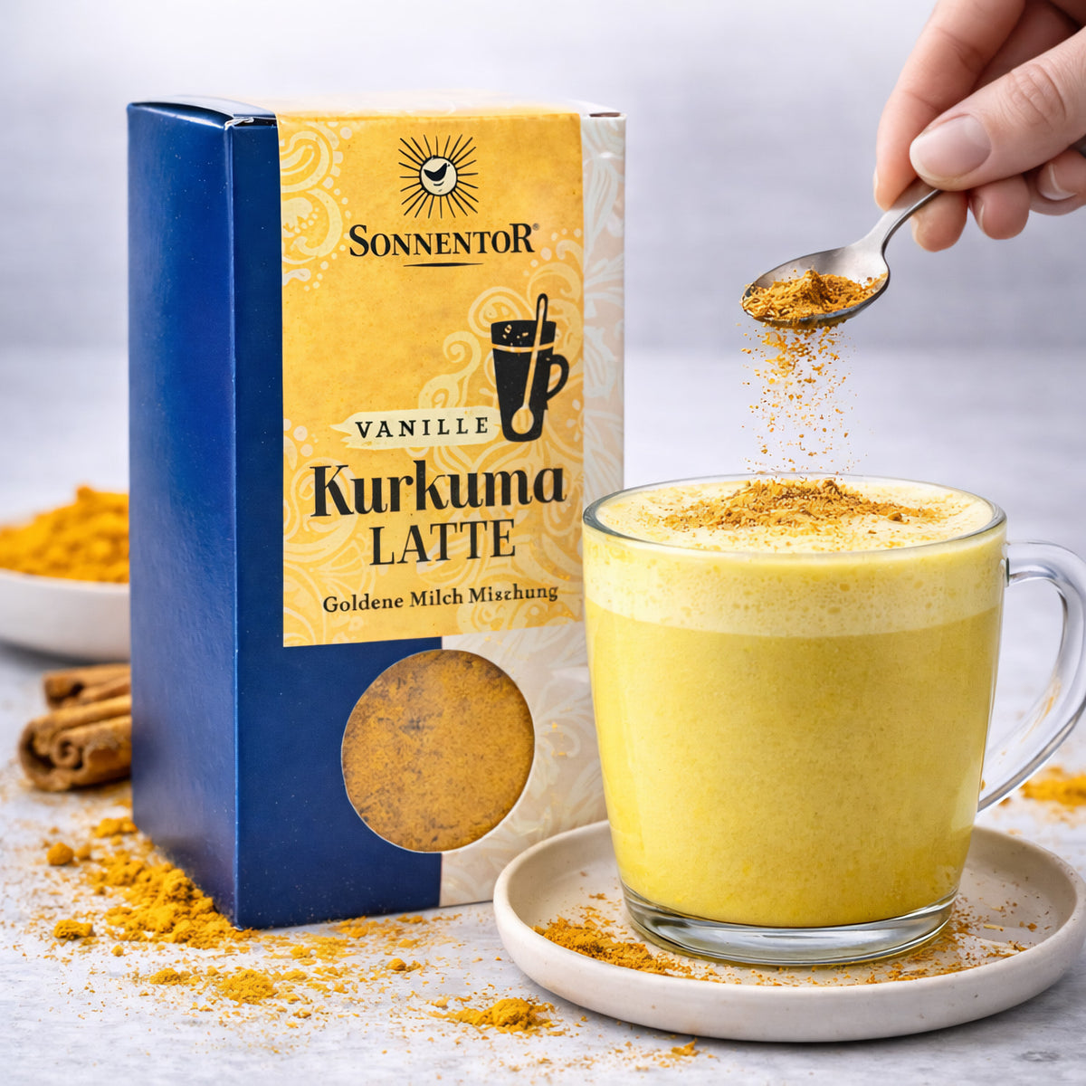 Bio Kurkuma Latte mit Ingwer von Sonnentor, Frühstücksgetränk in 60g Packung, cremig und aromatisch, ideal für einen gesunden Start.