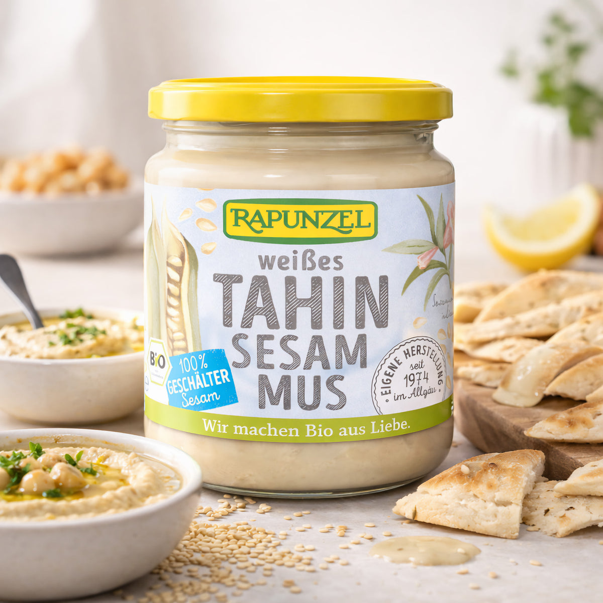 Weißes Tahin Sesammus von Rapunzel in 250 g Bio-Qualität, ideal zum Kochen, zeigt den cremigen Sesampaste-Topf.