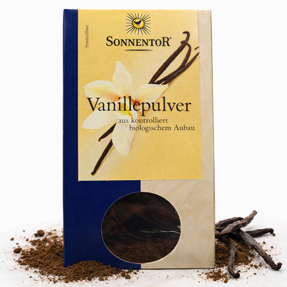 Bio Vanillepulver von Sonnentor in einer Schüssel, zum Kochen geeignet, zeigt die Vanillepulver-Textur in einer Küchenumgebung