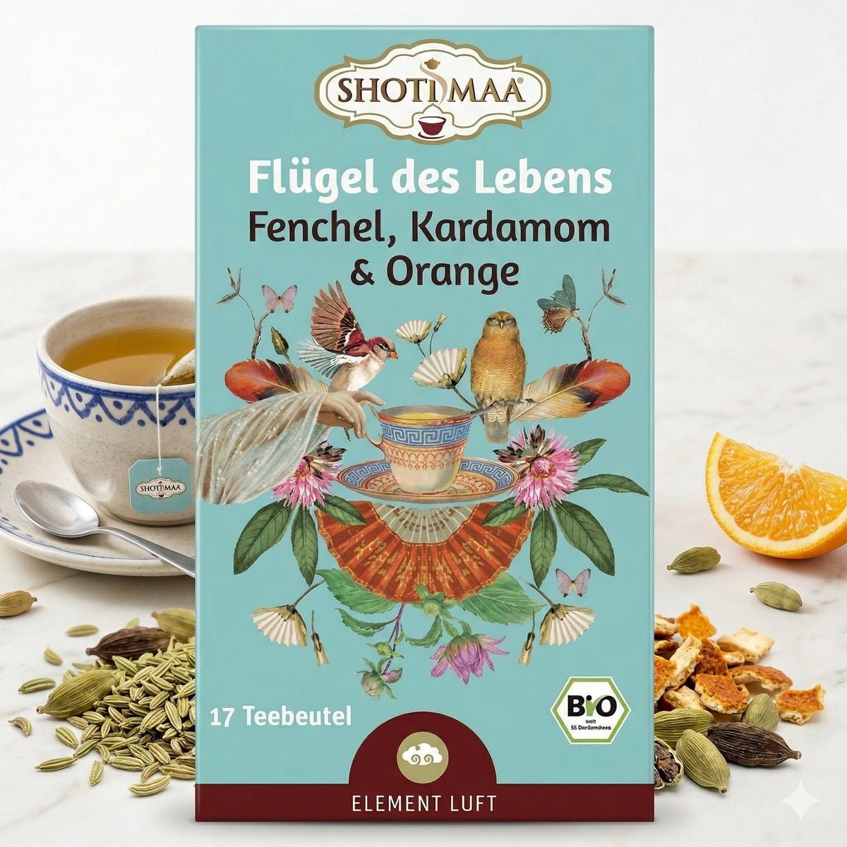 Bio Kräutertee "Flügel des Lebens" von Shoti Maa in Teebeuteln, zeigt frische Kräuter und Teebeutel, ideal für wohltuenden Genuss