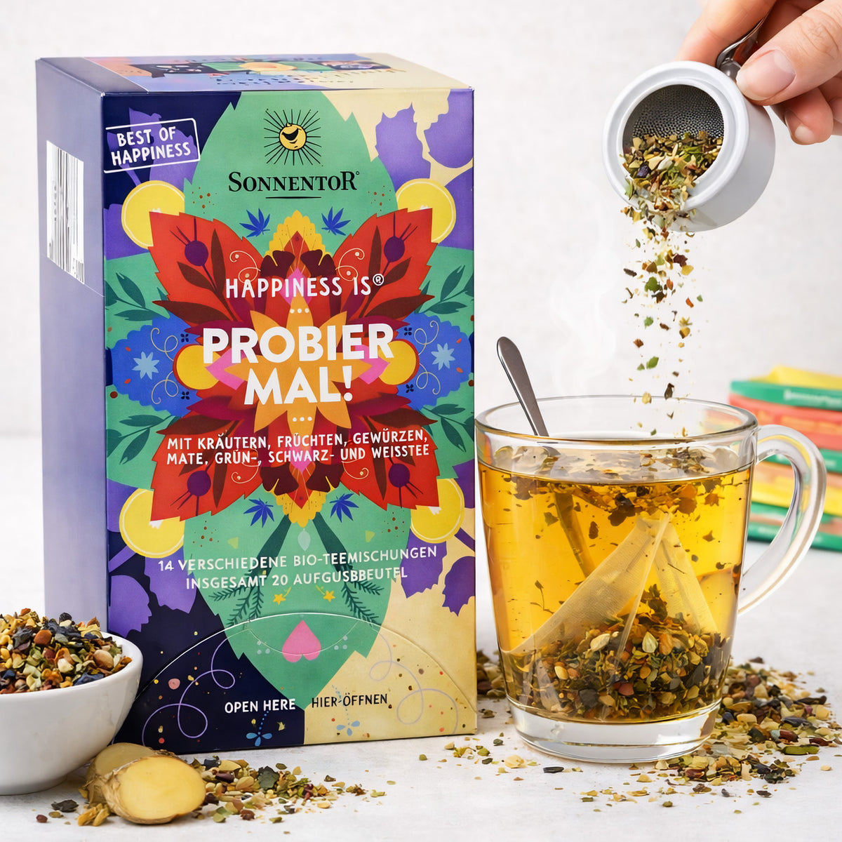 Bio-Tee von Sonnentor, Probier mal! Happiness, 32g, mit frischen Kräutern und natürlichen Zutaten in einer ansprechenden Verpackung.