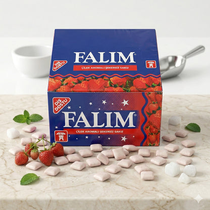 Falim Erdbeeraroma Kaugummi, 100 Stück, Snacks in einer offenen Packung mit fruchtigem Erdbeergeschmack.