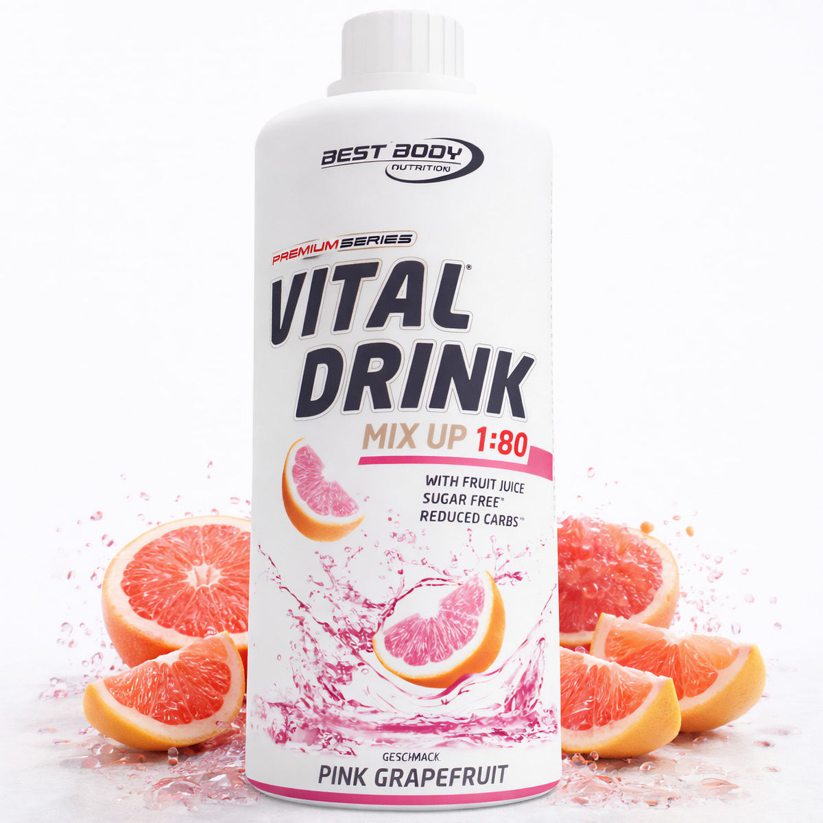 Vital Drink Pink Grapefruit von Best Body Nutrition, Flasche von vorne, Grapefruitstücke und rosa Spritzwasser im Vordergrund.