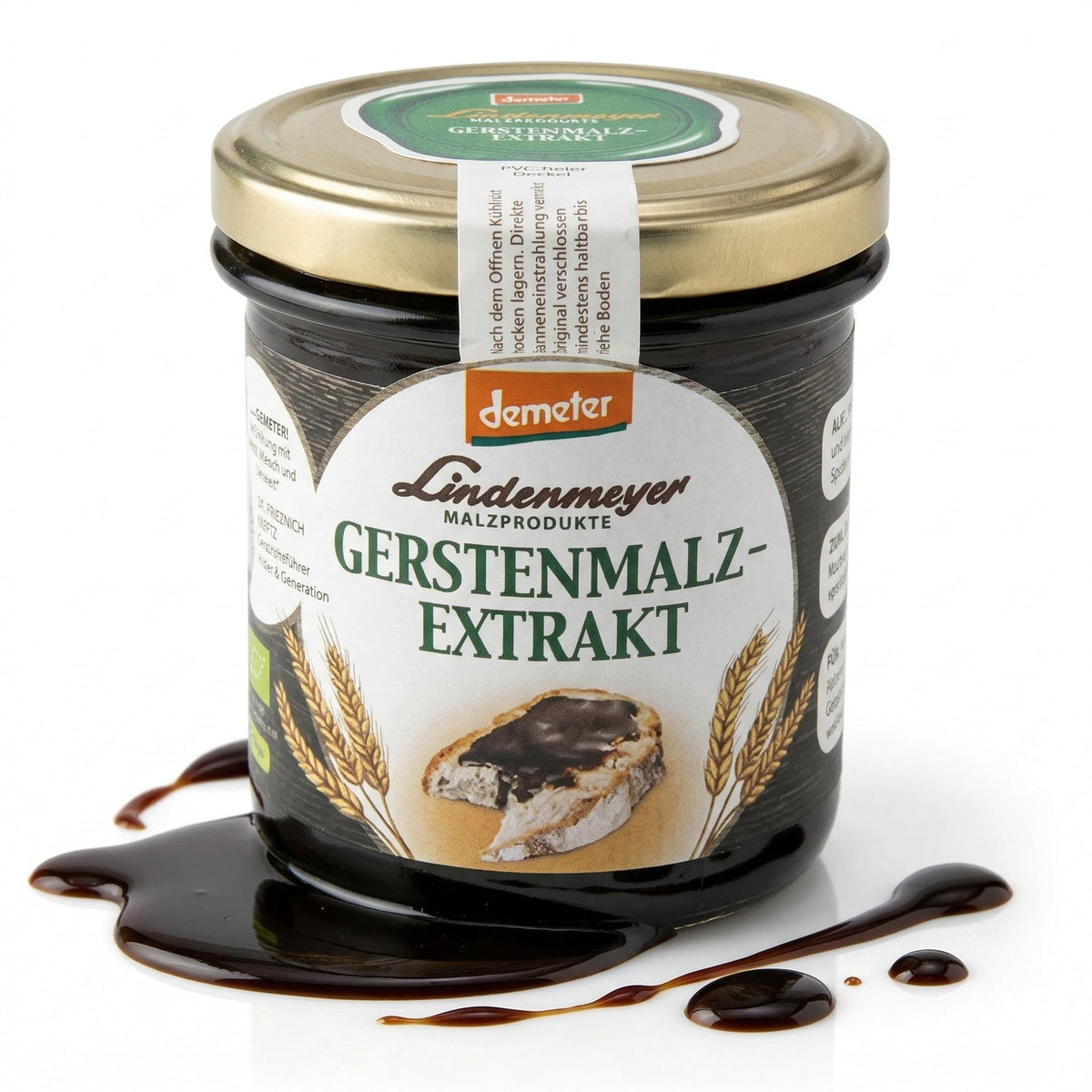 Glas Donath Gerstenmalzextrakt 400g mit ausgelaufener dunkler Malzmasse auf weißem Untergrund, Etikett mit Brot und Ähren sichtbar.