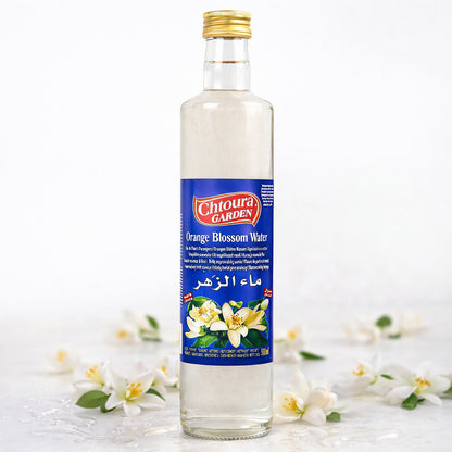 Orangenblütenwasser von Chtoura Garden in 500ml Flasche, für Backen und kulinarische Anwendungen, mit blumigem Aroma.
