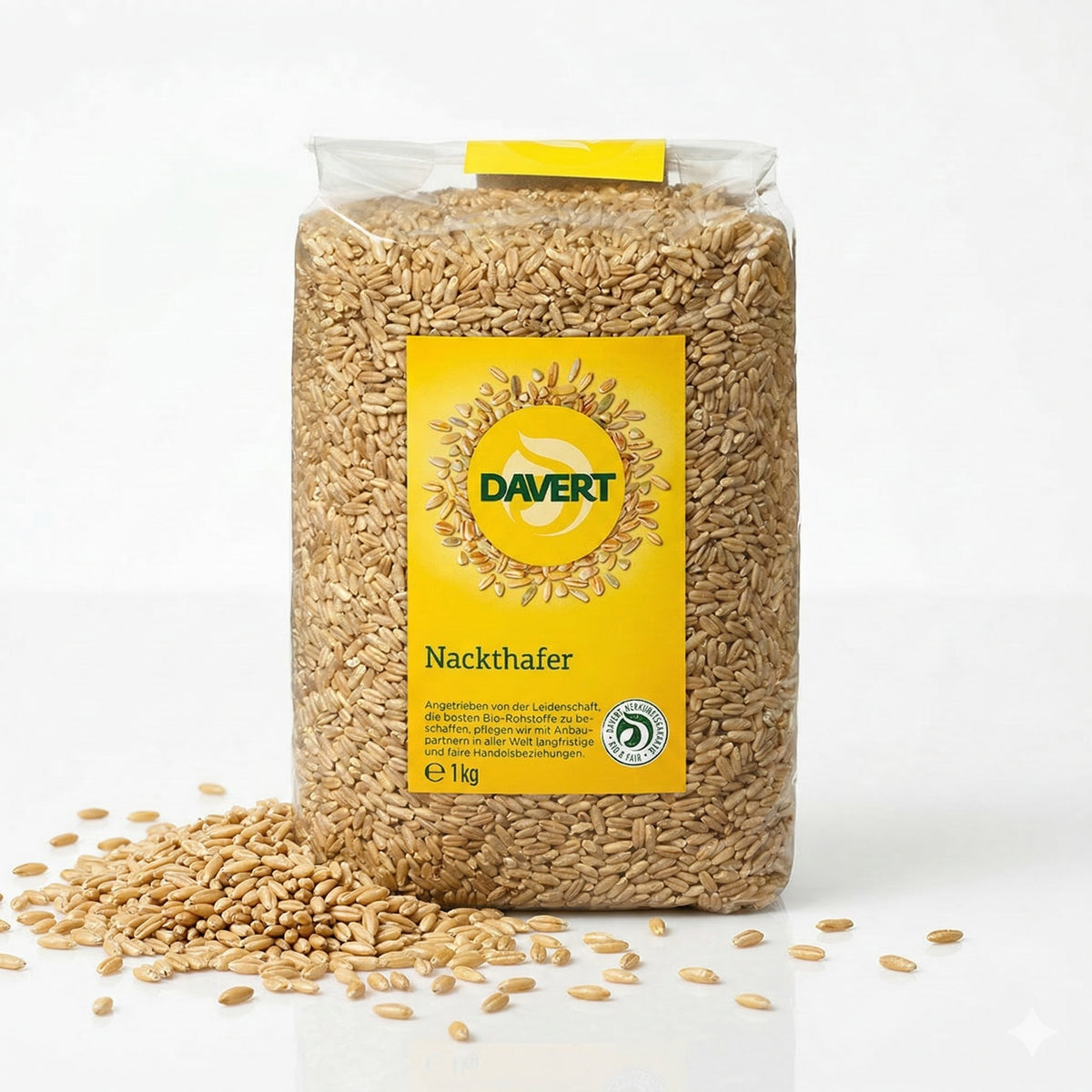 Bio Nackthafer von Davert, roh und ungeschält, ideal zum Kochen, in einem transparenten Behälter sichtbar