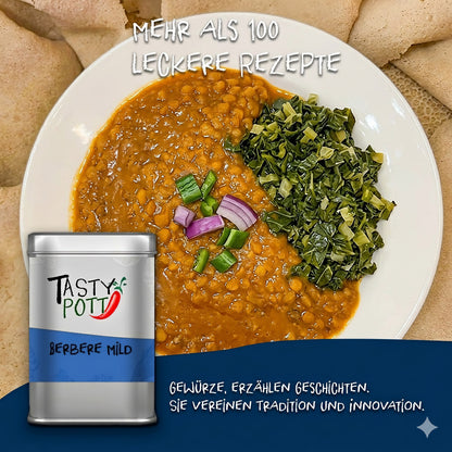 Tasty Pott Berbere mild Dose vor einem Teller mit Linsen, grünem Gemüse und Fladenbrot, angerichtet als äthiopisches Gericht.