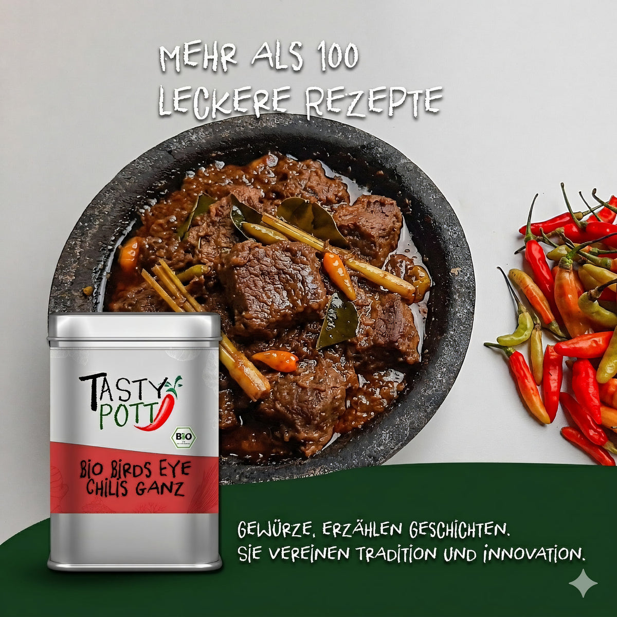 Tasty Pott Dose Bio Birds Eye Chilis ganz, getrocknet, vor einem Teller mit scharfem Fleischgericht und frischen Chilis als Dekoration.