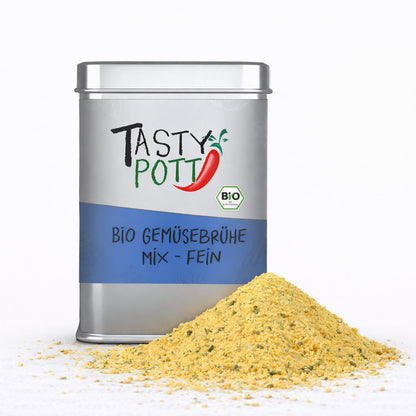 Tasty Pott Bio Gemüsebrühe in silberner Dose mit blauem Etikett, davor ein Häufchen gelbes Brühepulver auf weißem Untergrund.