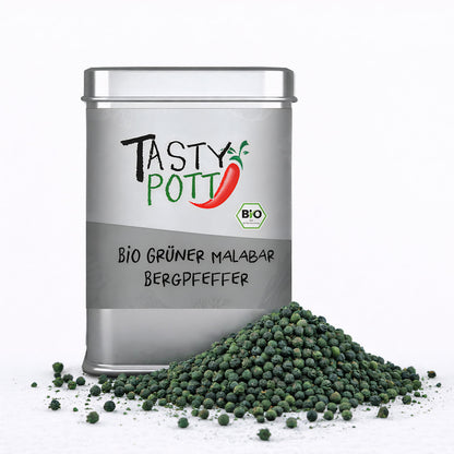 Tasty Pott Dose Bio Grüner Malabar Pfeffer mit losem Haufen grüner Pfefferkörner davor auf weißem Untergrund