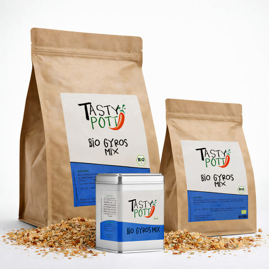 Drei Tasty Pott Bio Gyros Gewürzmischung Packungen und Streudose mit sichtbarer Gewürzmischung auf weißem Hintergrund.