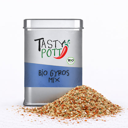 Tasty Pott Bio Gyros Gewürzmischung in silberner Dose mit losem Gyros-Gewürz vor der Dose auf weißem Untergrund.