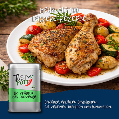 Tasty Pott Bio Kräuter der Provence Dose vor einem Teller mit gewürztem Hähnchen, Kartoffeln und Gemüse.