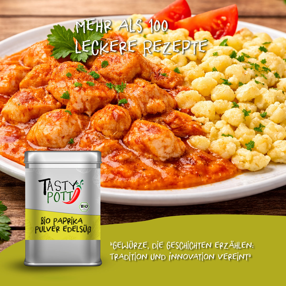 Tasty Pott Bio Paprikapulver edelsüß Dose vor einem Teller Gulasch mit Spätzle als Beispiel für fleischgewürz beim Kochen.