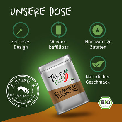 Tasty Pott Bio Pyramidenflocken Chili Salz Dose auf grünem Hintergrund mit Icons für Design, Wiederbefüllbarkeit und natürliche Zutaten.