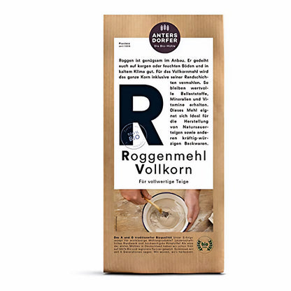 Antersdorfer Roggenmehl Vollkorn in brauner Papiertüte, vorderseitig mit großem Etikett und Abbildung einer Schüssel mit angerührtem Mehl.