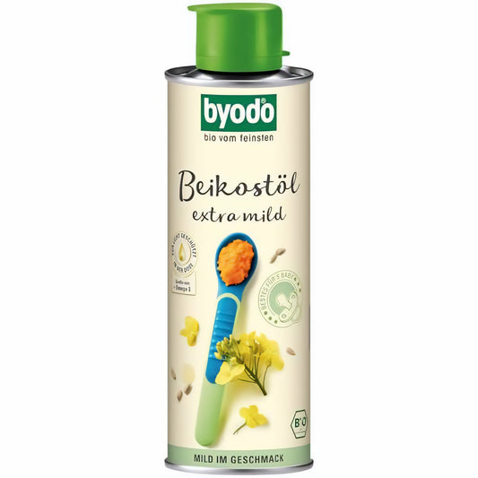 Byodo Babyöl in 250ml Weißblechdose mit grünem Deckel, Abbildung eines Löffels mit Brei, Rapsblüte und Hinweis auf extra milde Beikost ab 5. Monat.