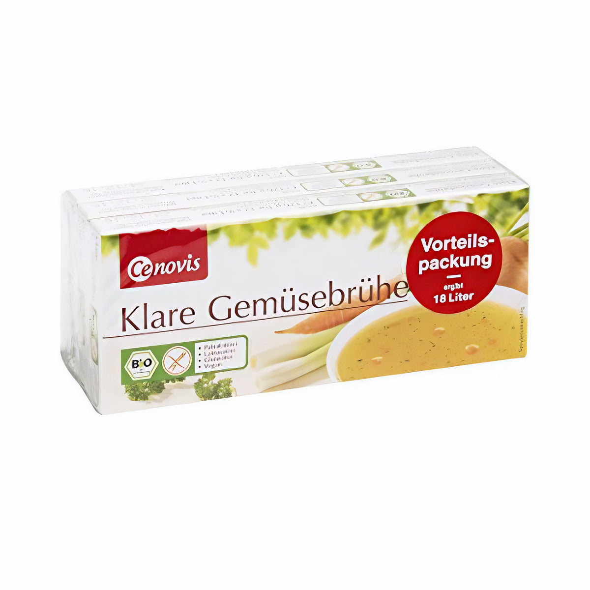 Cenovis Gemüsebrühe Vorteilspackung als Brühwürfel, schräg von vorne fotografiert, Suppenteller und Gemüse sichtbar.