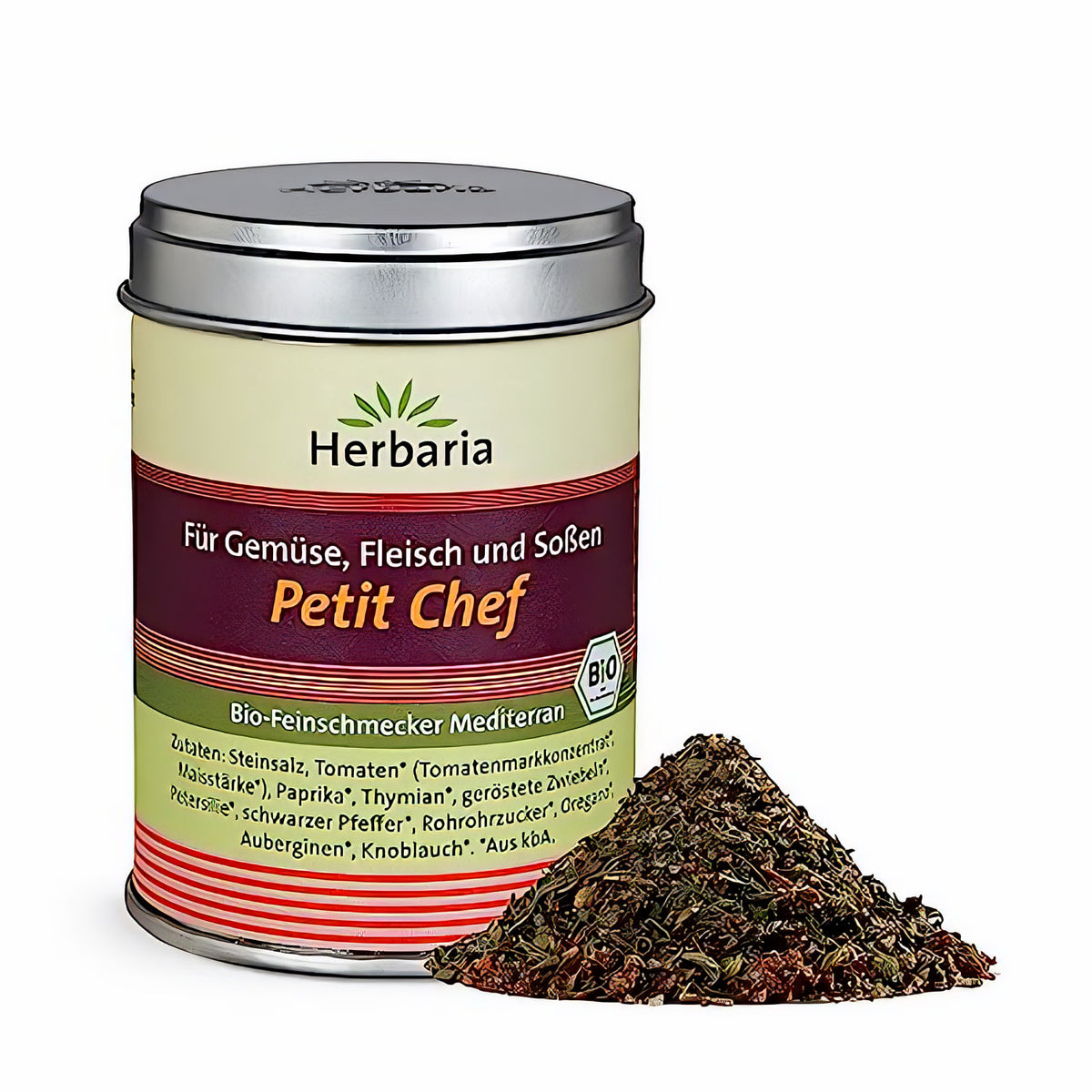 Herbaria Petit Chef Gewürzmischung in silberner Dose, daneben ein kleiner Haufen mediterranes Bio-Gewürz auf weißem Hintergrund.