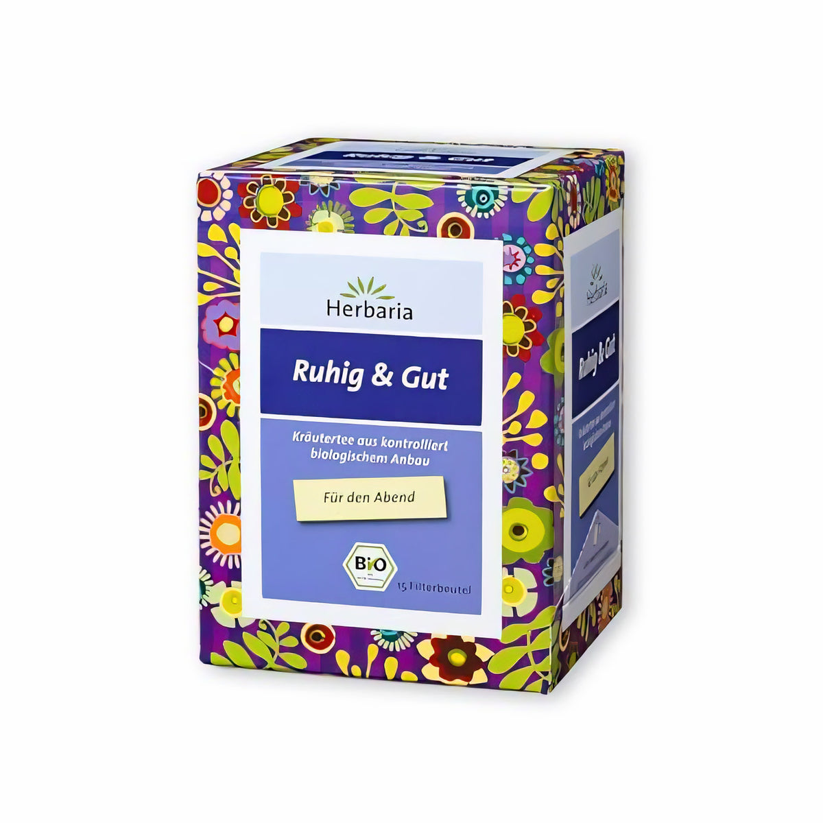 Herbaria Ruhig & Gut Kräutertee in bunter Verpackung mit Blumenmuster, Vorderseite mit Produktlabel sichtbar.