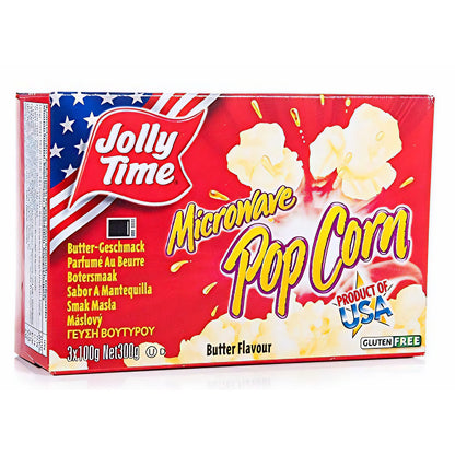 Jolly Time Microwave Popcorn Butter in roter Verpackung mit Popcorn-Abbildungen und amerikanischer Flagge, Vorderseite mit Produktinformationen.