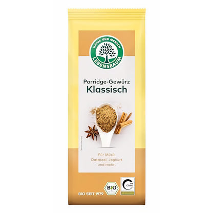 Vorderseite der lebensbaum Verpackung für klassisches Porridge-Gewürz mit Löffel, Zimtstangen und Sternanis als Frühstücks-Gewürzmischung abgebildet.