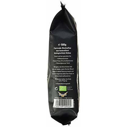 Seitenansicht der Mount Hagen Arabica Kaffee 500g Packung mit Text zu Fairtrade-Röstkaffee, Zubereitungstipps für Filterkaffee und Barcode unten.